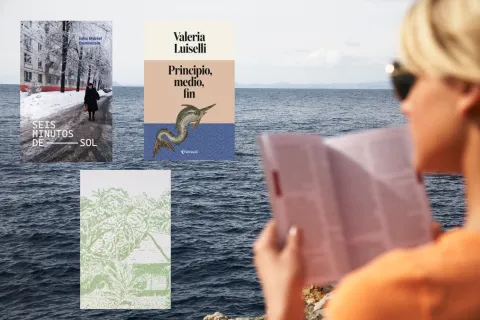 Una mujer leyendo frente al mar