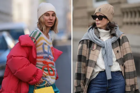 una mujer caminando por la calle abrigada por el frio
